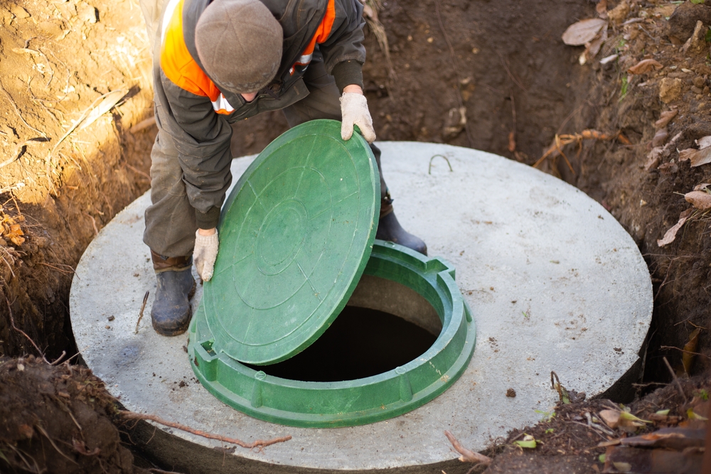 Manholes Exposed For Pumping Septic Maintenance In Jordan, MN